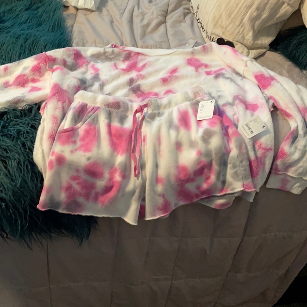 The sweatshirt is a size small shorts are a medium